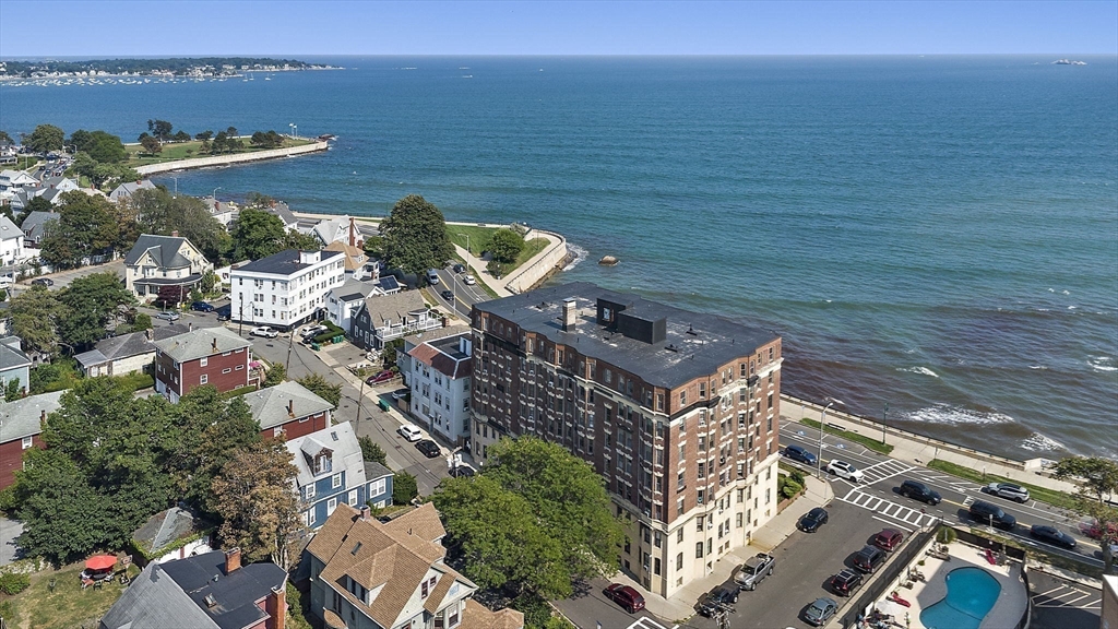 285 Lynn Shore Drive, Unit 508 Lynn, MA 01902 - Photo 13 of 18 a view of a lake with a building in the background