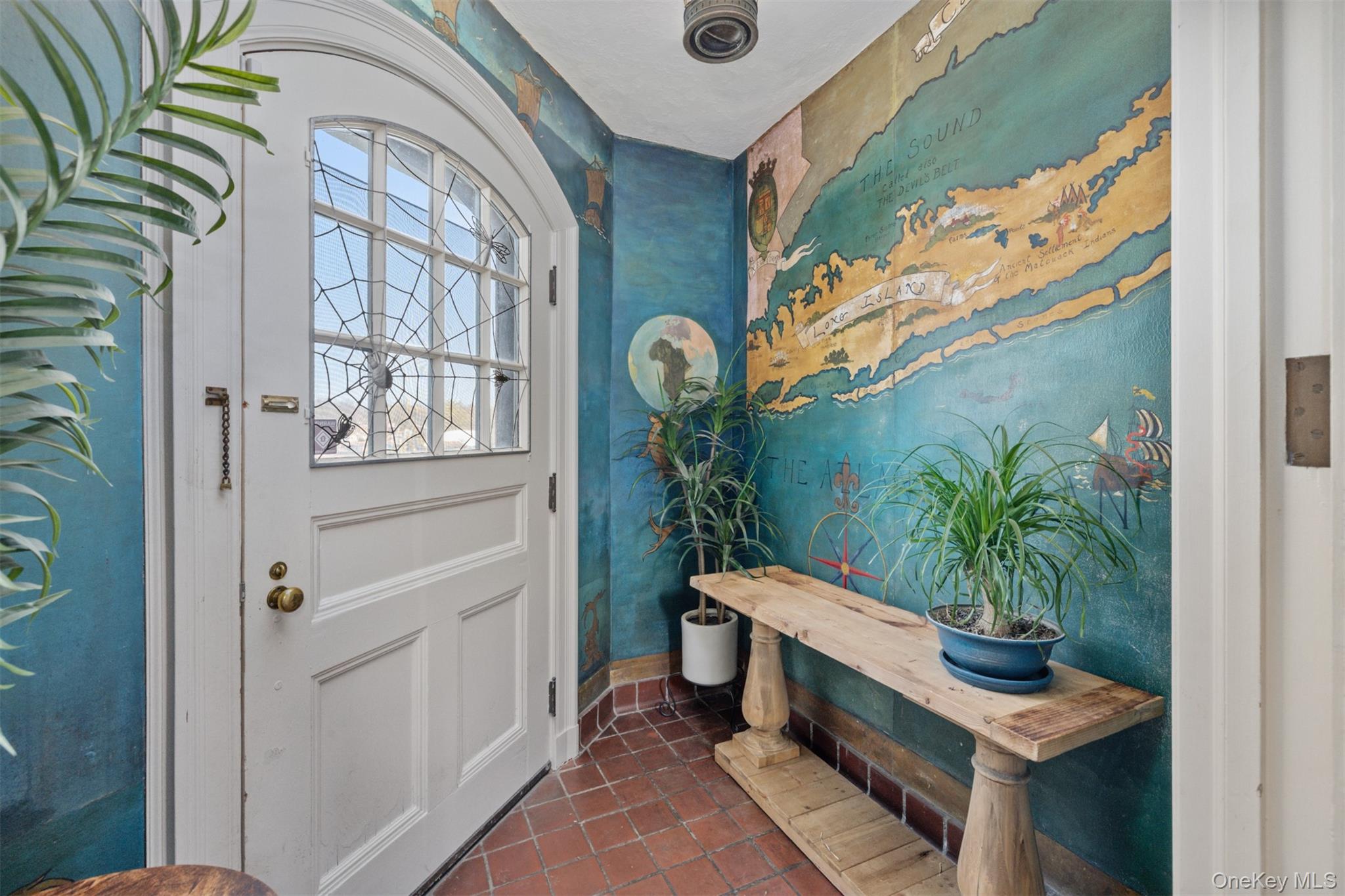 11-20 Shore Road Queens, NY 11363 - Photo 11 of 46 a room with furniture and a potted plant