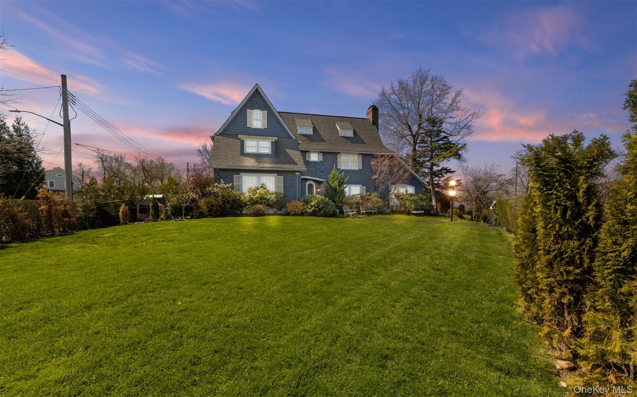 11-20 Shore Road Queens, NY 11363 - Photo 2 of 46 a view of building with outdoor space