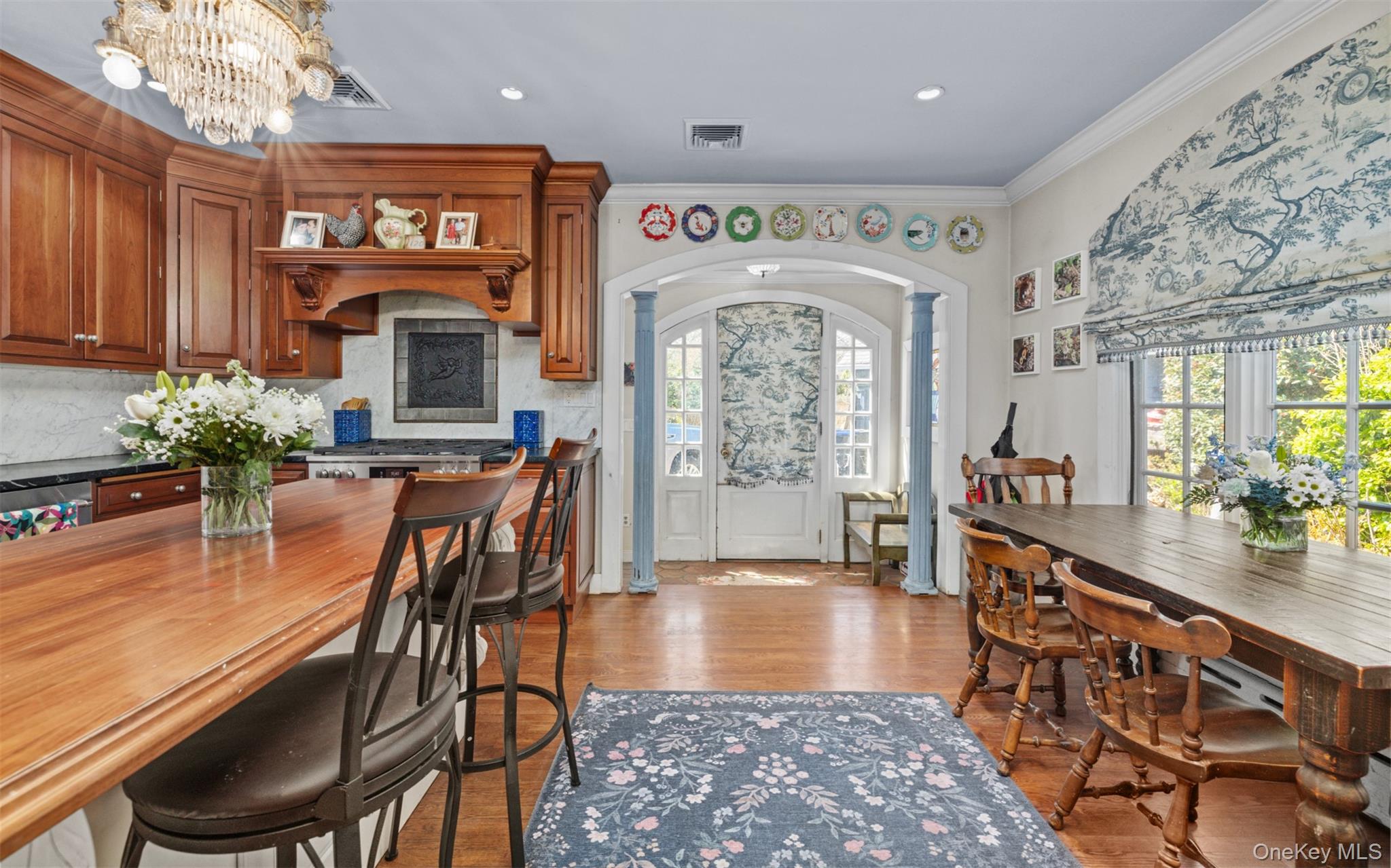 11-20 Shore Road Queens, NY 11363 - Photo 22 of 46 a view of a dining room with furniture window and wooden floor