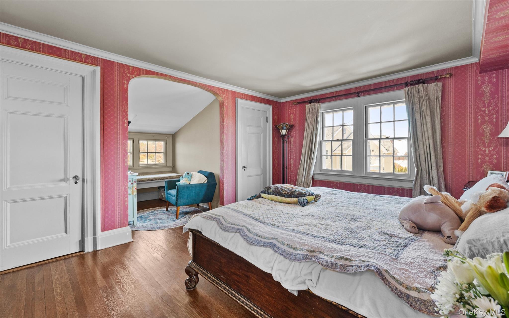 11-20 Shore Road Queens, NY 11363 - Photo 24 of 46 a bedroom with a bed and wooden floor