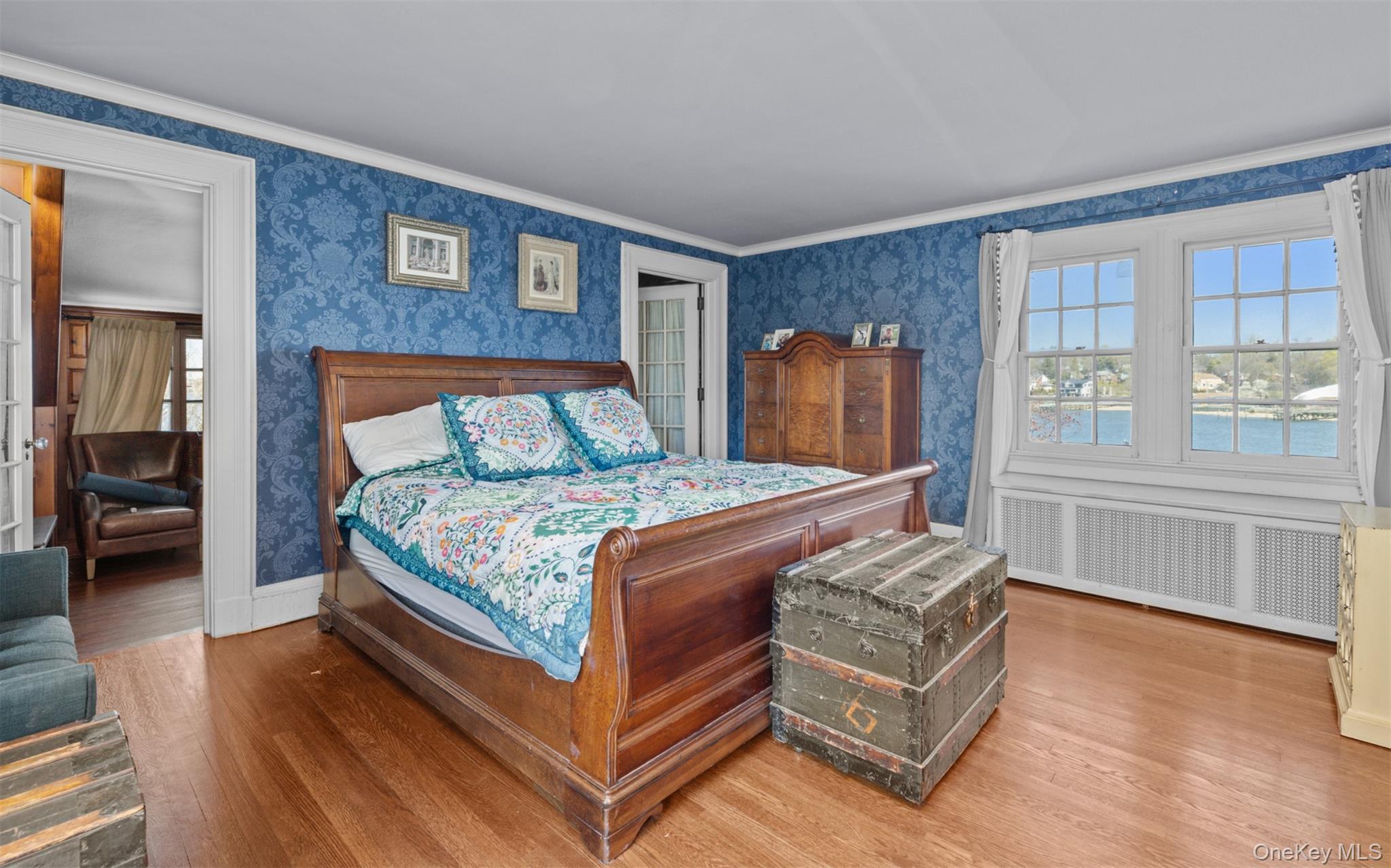 11-20 Shore Road Queens, NY 11363 - Photo 28 of 46 a bedroom with a bed and a dresser