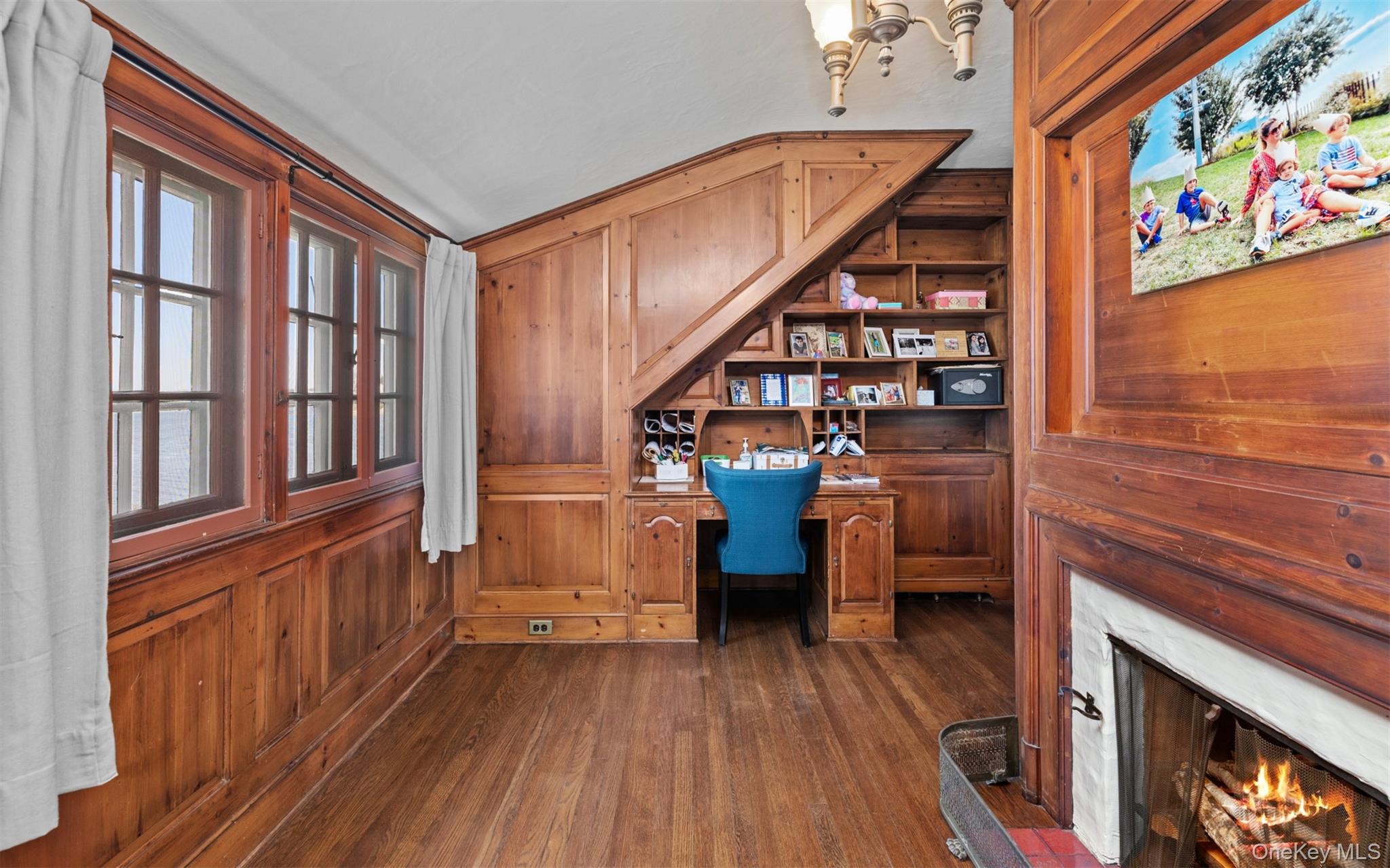 11-20 Shore Road Queens, NY 11363 - Photo 29 of 46 a view of staircase with wooden floor and furniture