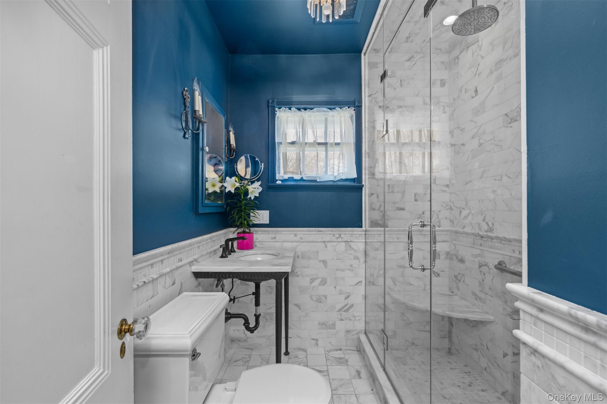 11-20 Shore Road Queens, NY 11363 - Photo 31 of 46 a bathroom with a sink toilet vanity and shower