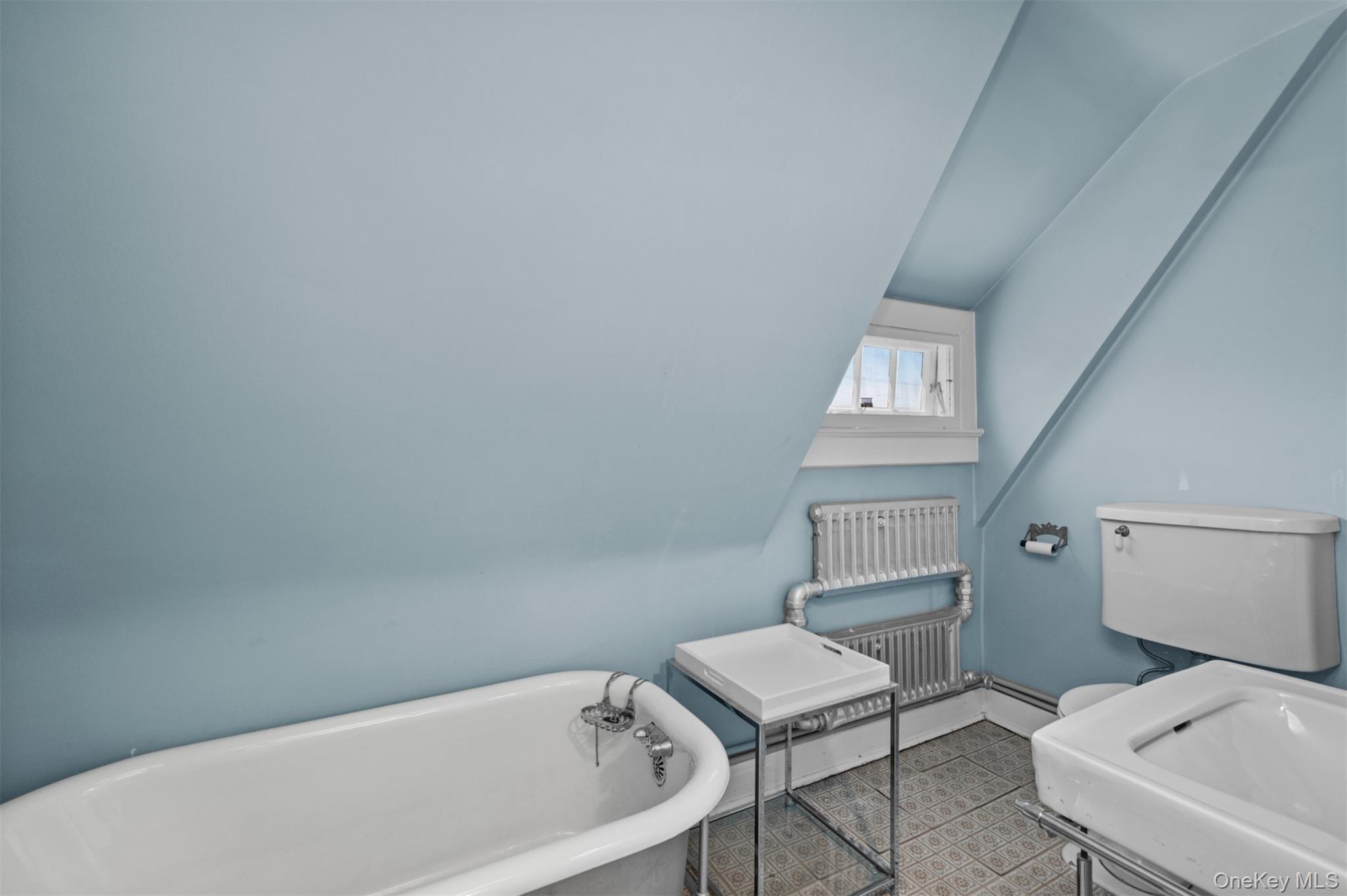 11-20 Shore Road Queens, NY 11363 - Photo 34 of 46 a bathroom with a sink and a bathtub