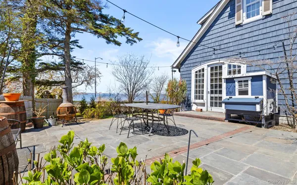 a view of a lake with a house in the background