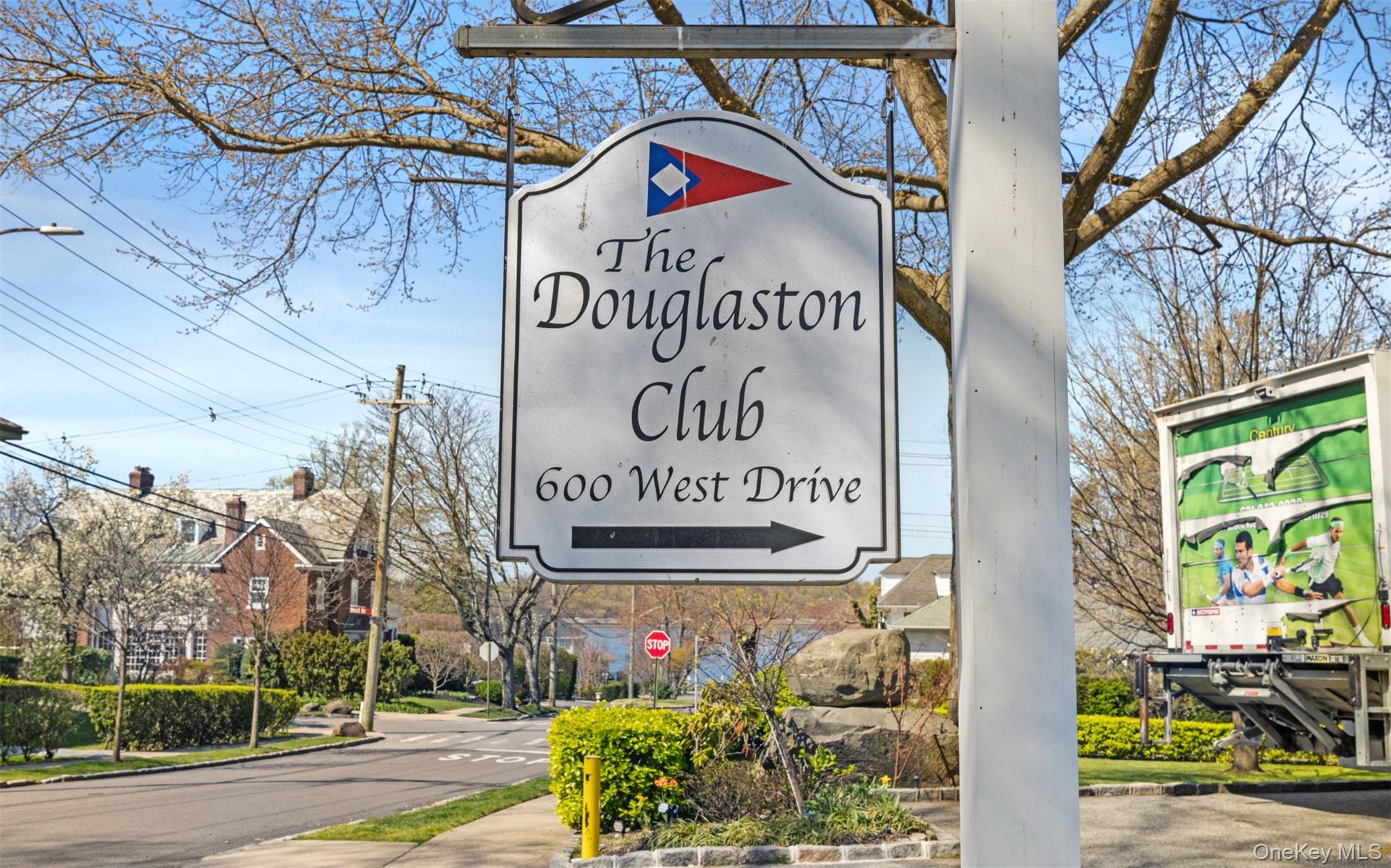 11-20 Shore Road Queens, NY 11363 - Photo 40 of 46 a sign on the side of a building