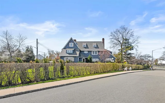 a view of a street in front of a house