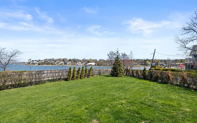 a view of a garden with houses