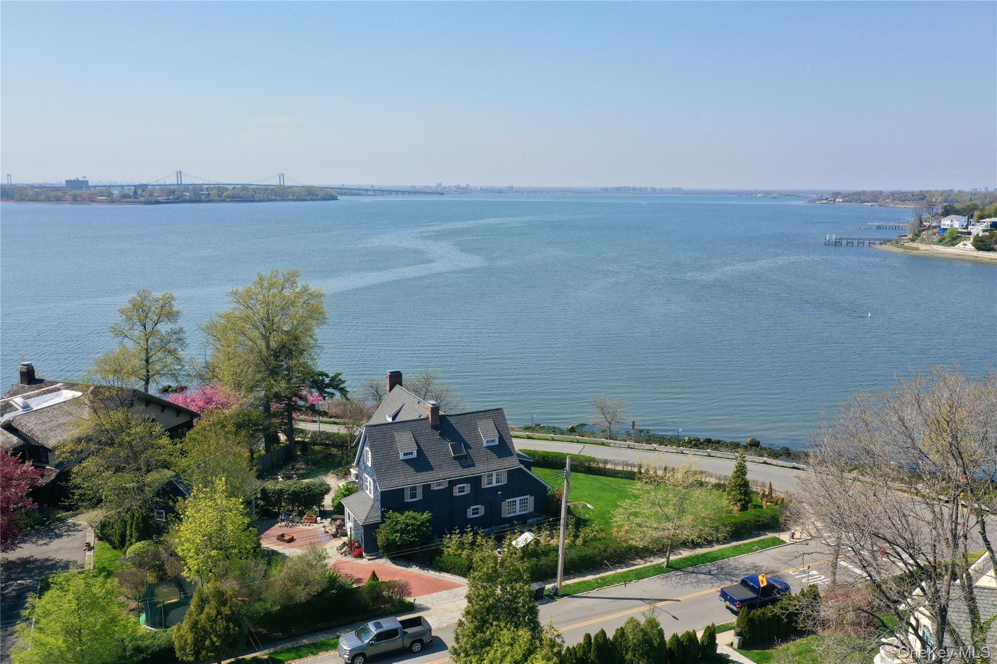 11-20 Shore Road Queens, NY 11363 - Photo 7 of 46 an aerial view of a house with lake view