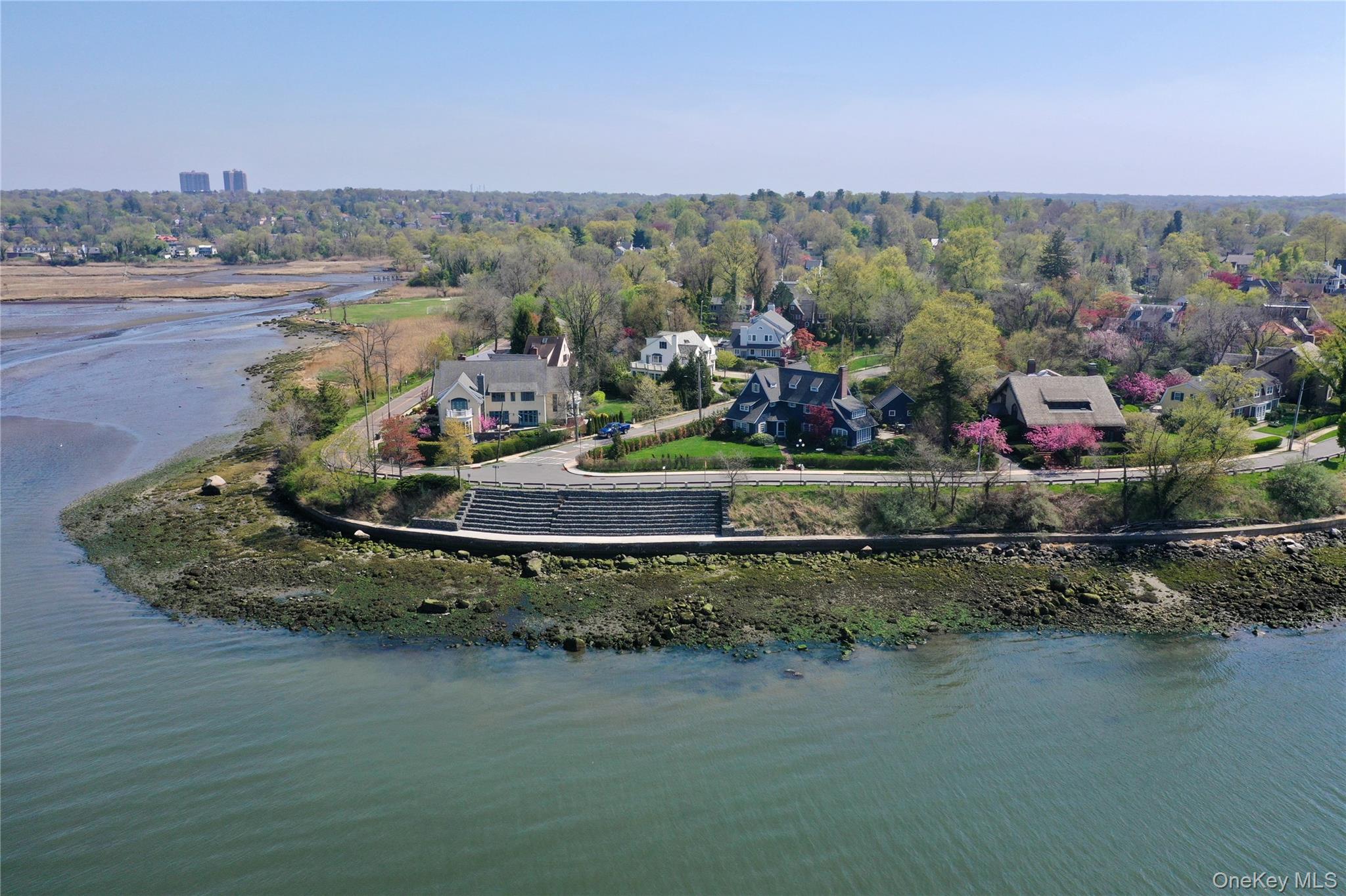 11-20 Shore Road Queens, NY 11363 - Photo 10 of 46 a view of a lake with a mountain