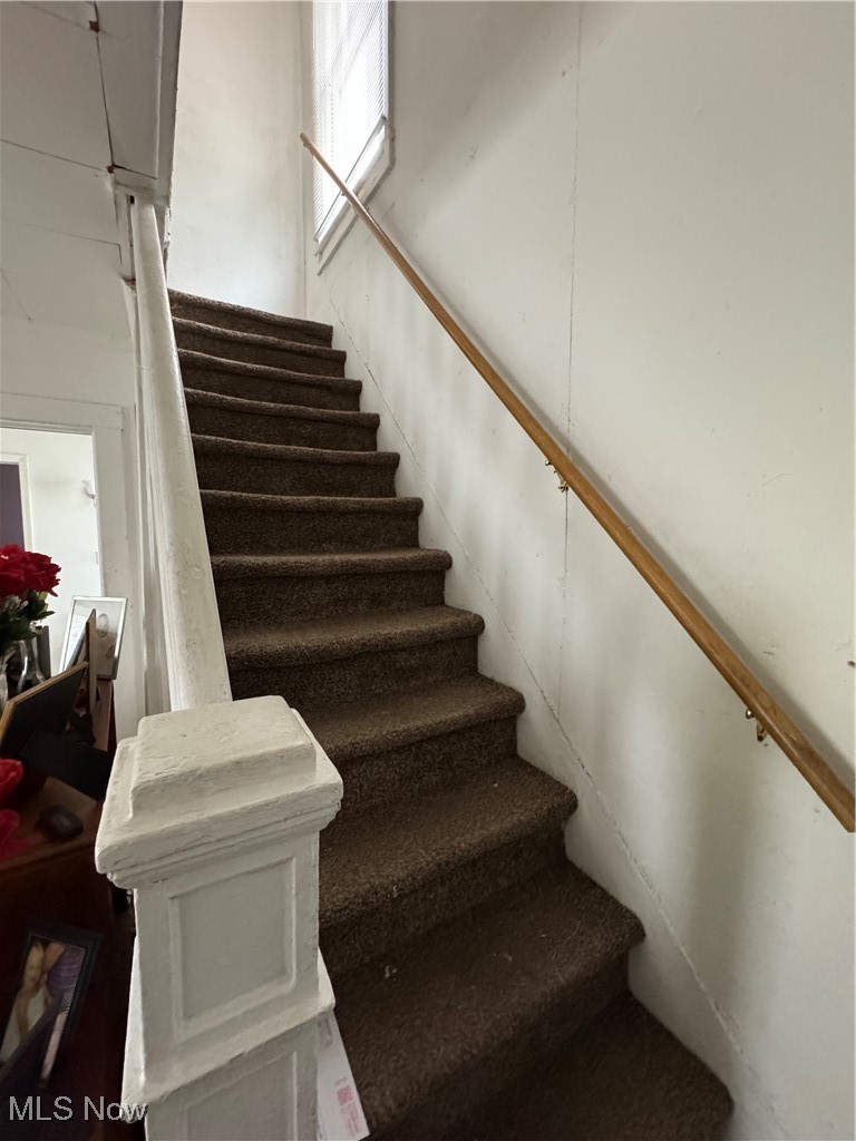 342 West Prospect Road Ashtabula, OH 44004 - Photo 17 of 26 View of stairs off living room to second floor