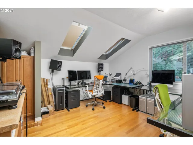 a view of a workspace with furniture