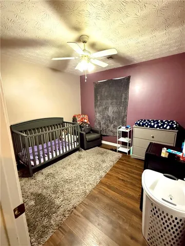 a view of a balcony with furniture