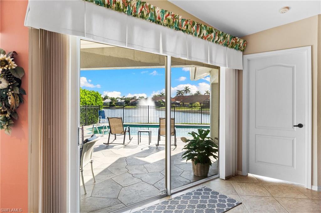 200 St James Way Naples, FL 34104 - Photo 25 of 45 Doorway to vast outside lanai