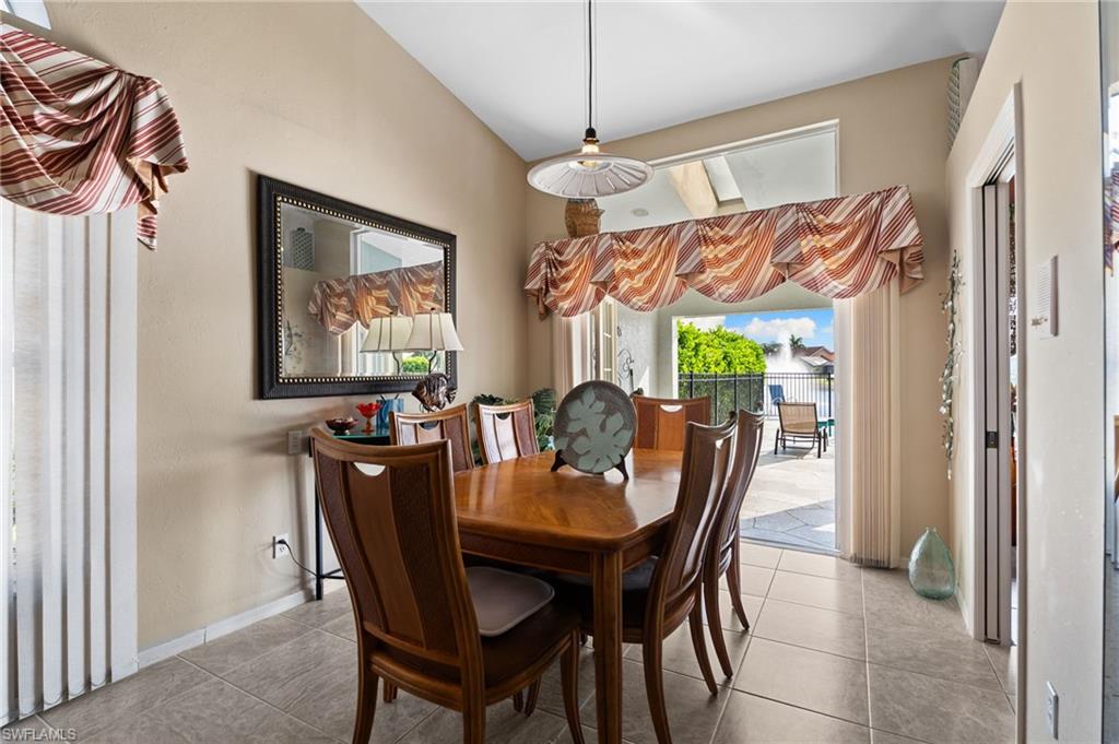 200 St James Way Naples, FL 34104 - Photo 5 of 45 Dining area with plenty of natural light and tile floors