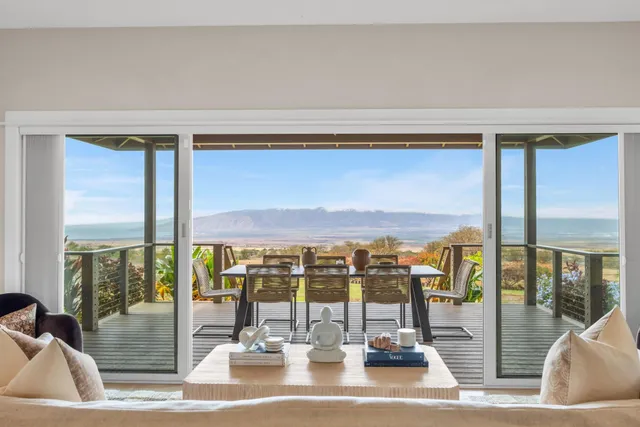 a view of a living room with balcony