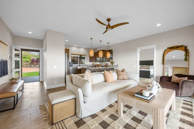 a kitchen with granite countertop cabinets a sink and stainless steel appliances