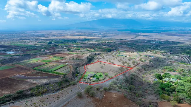 a view of a city with an ocean