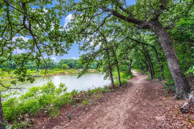 a view of lake with green space
