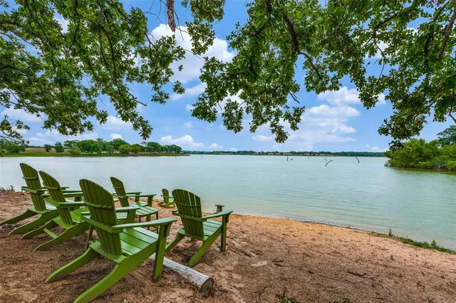 a view of backyard with sitting area