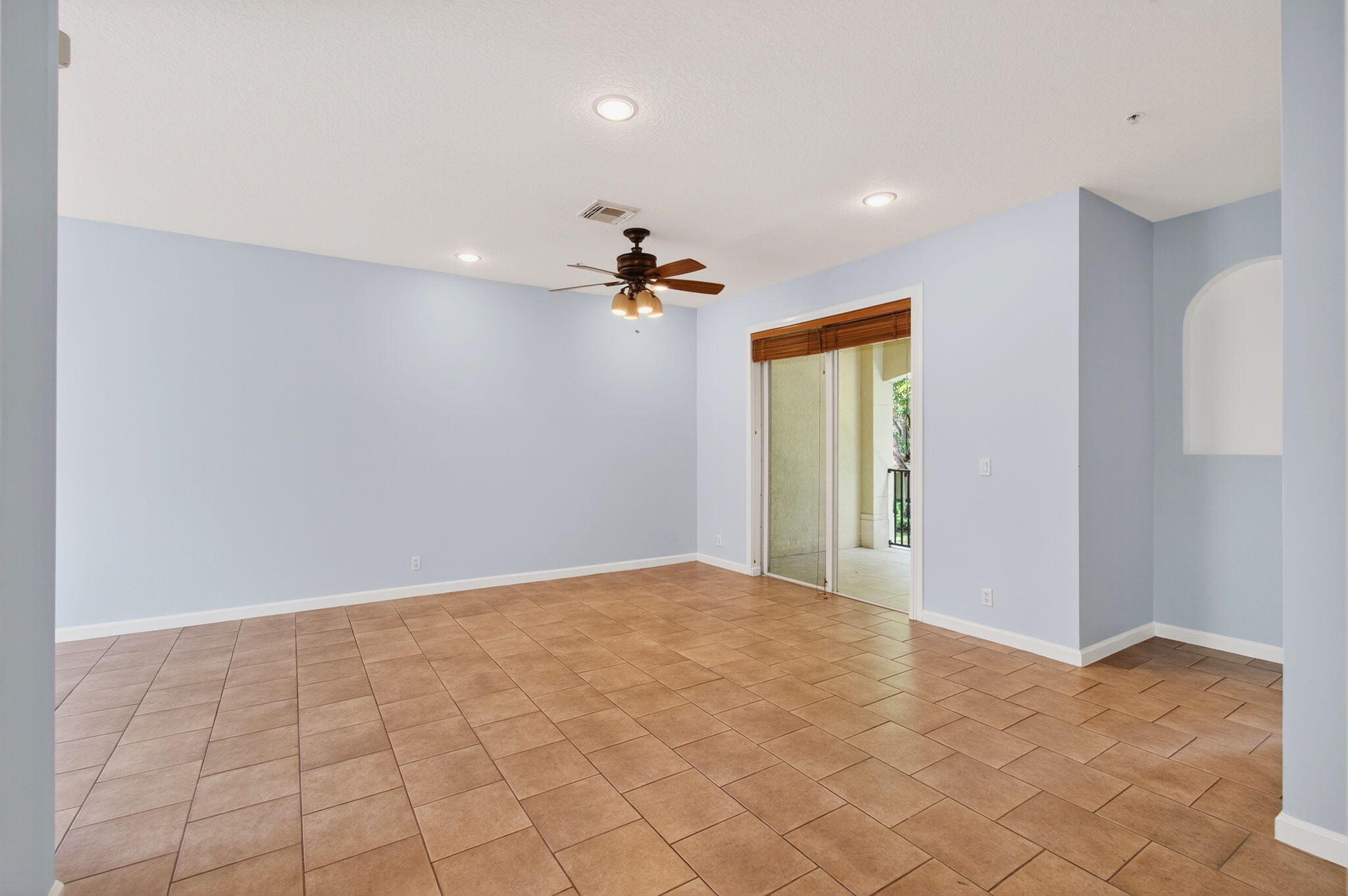 4582 Danson Way Delray Beach, FL 33445 - Photo 12 of 74 a view of a livingroom with a ceiling fan and window