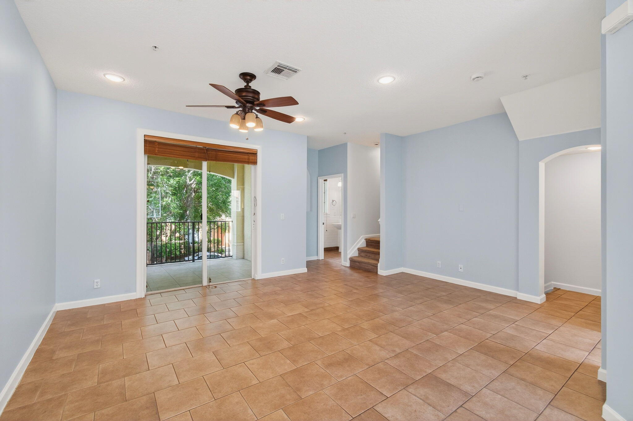 4582 Danson Way Delray Beach, FL 33445 - Photo 13 of 74 a view of a livingroom with a ceiling fan and window