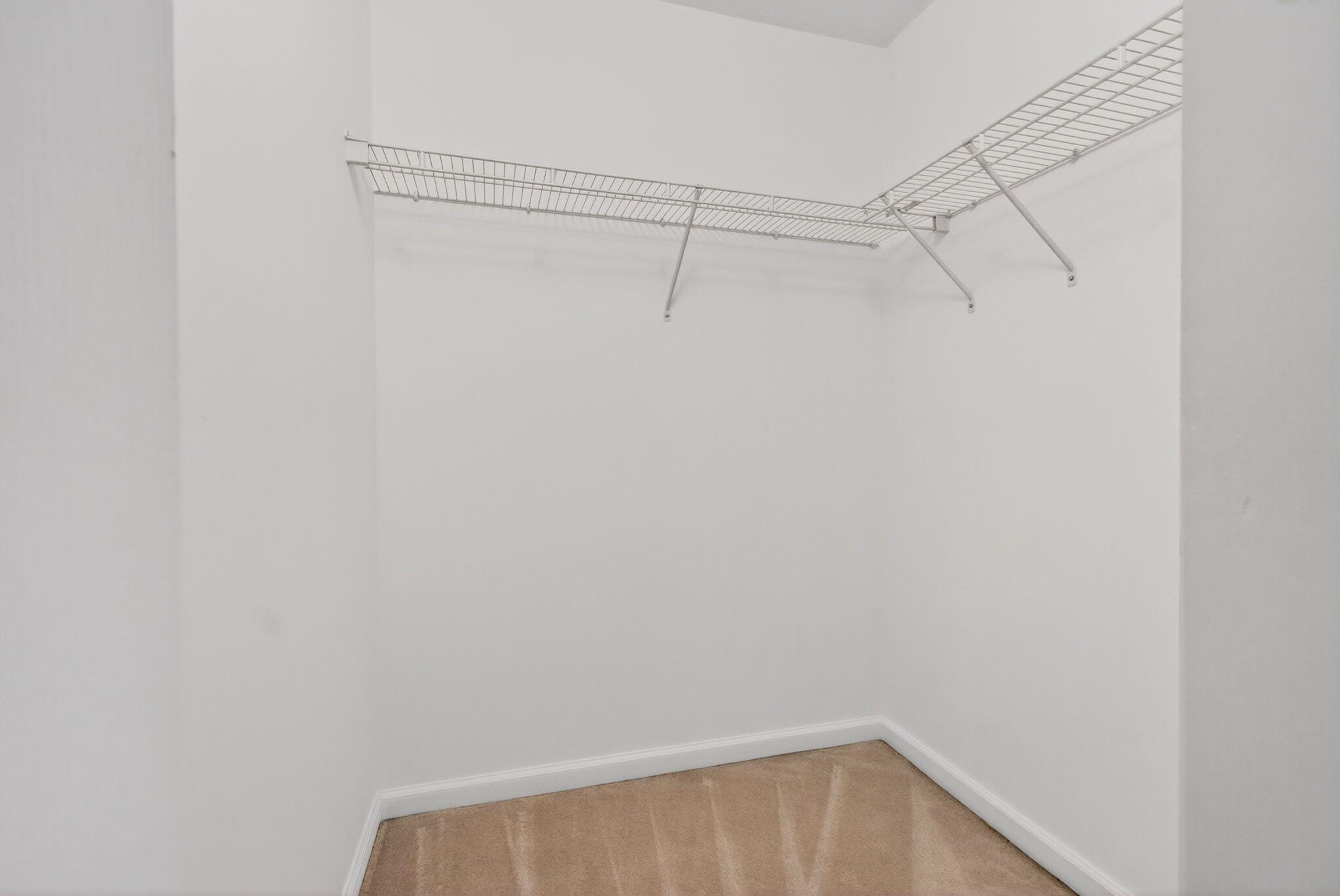 4582 Danson Way Delray Beach, FL 33445 - Photo 26 of 74 a view of a room with racks on the wall