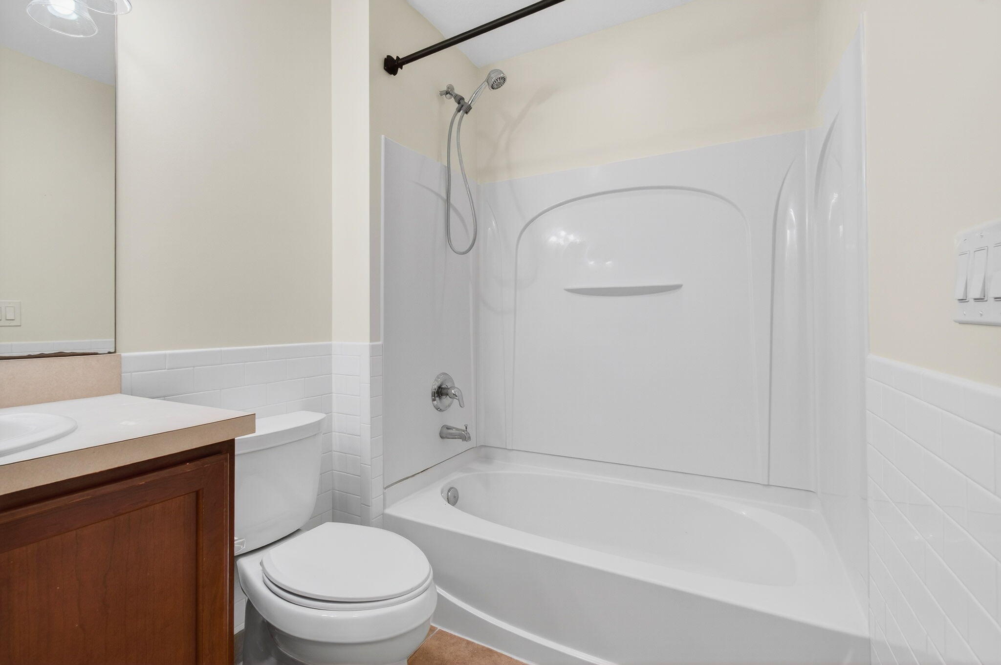 4582 Danson Way Delray Beach, FL 33445 - Photo 38 of 74 a bathroom with a granite countertop bathtub shower sink vanity and toilet