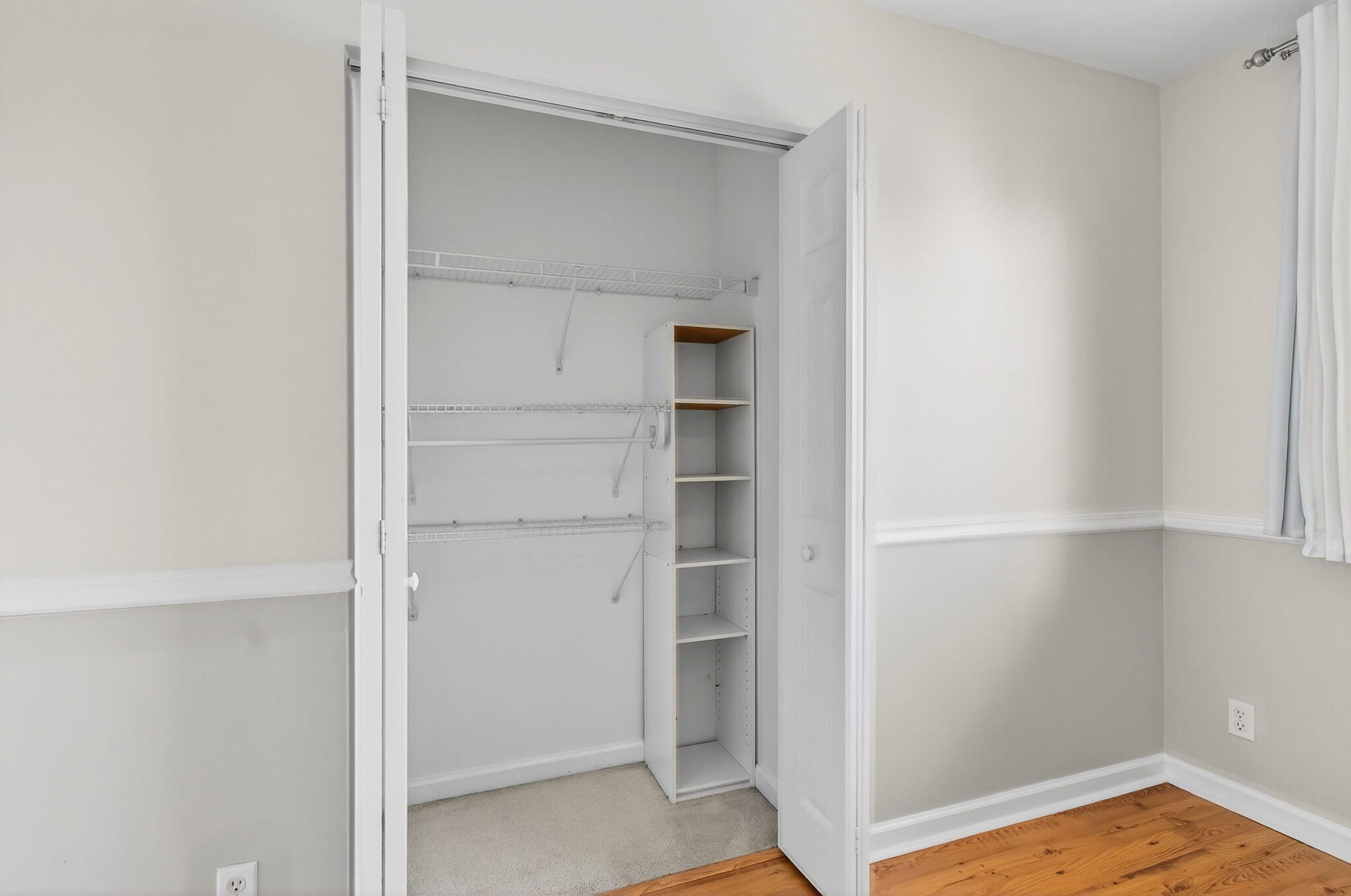 4582 Danson Way Delray Beach, FL 33445 - Photo 42 of 74 a view of a room with rack on the wall