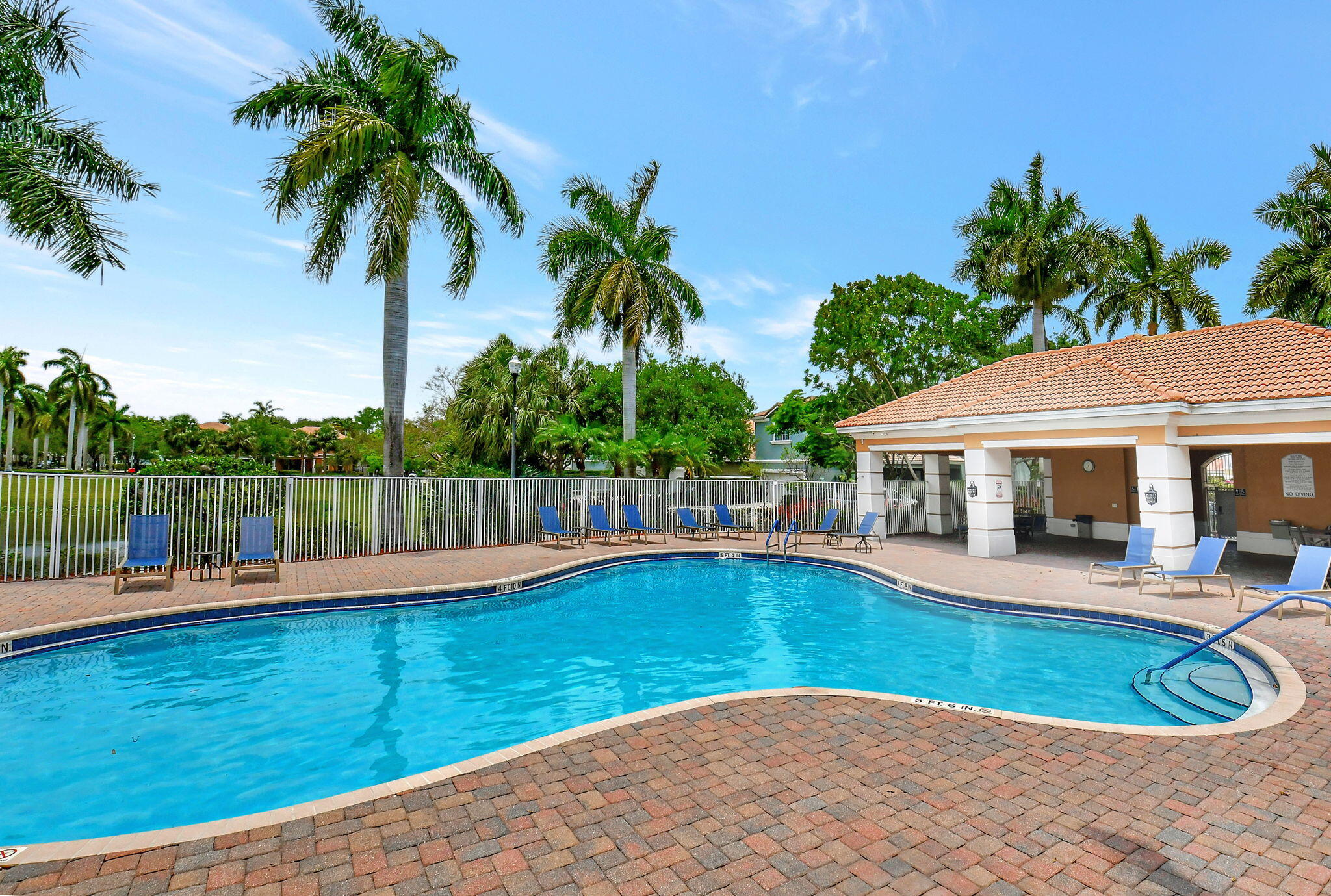 4582 Danson Way Delray Beach, FL 33445 - Photo 58 of 74 a view of a house with swimming pool and porch with furniture