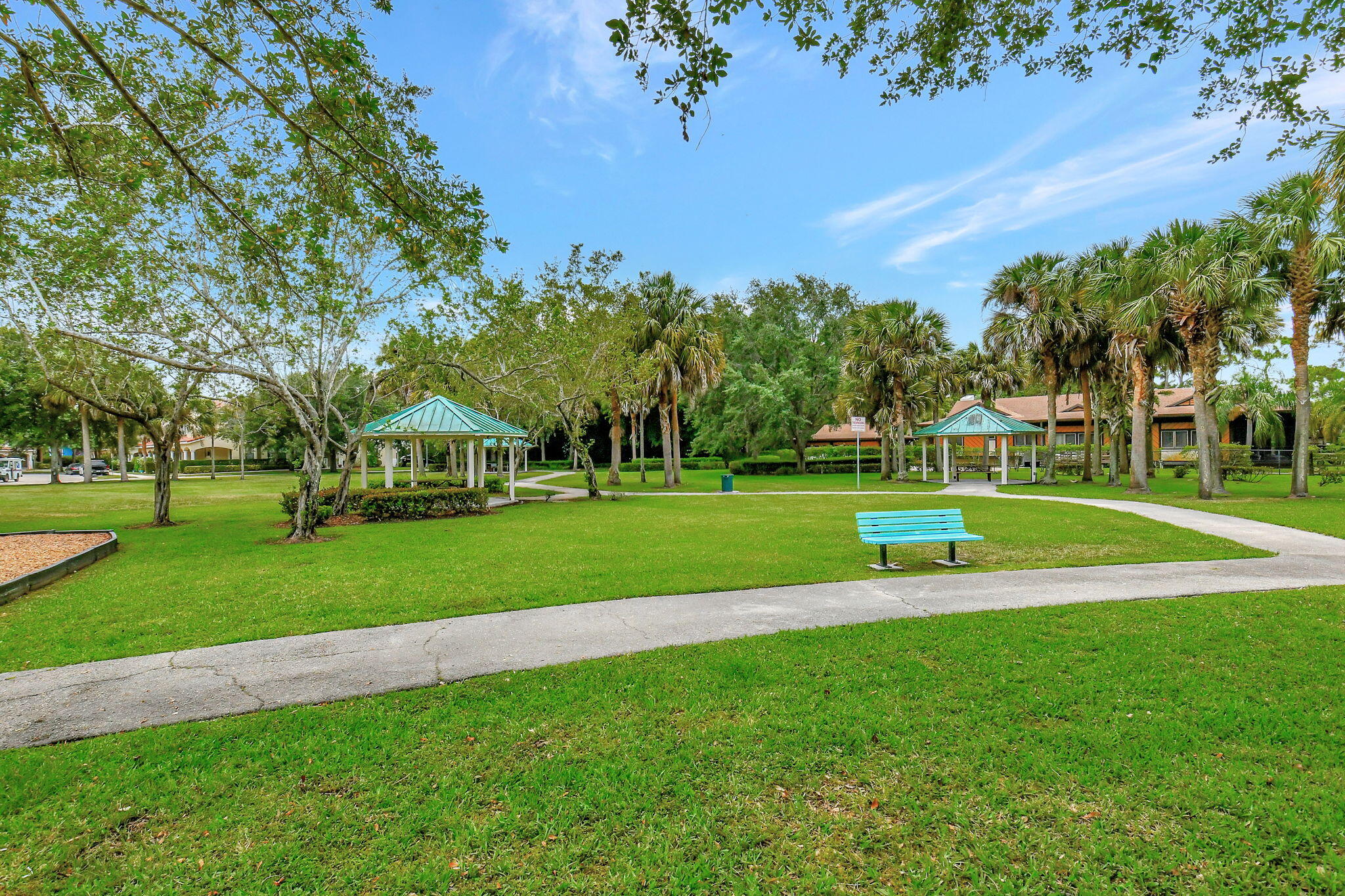 4582 Danson Way Delray Beach, FL 33445 - Photo 67 of 74 a view of a park with large trees and plants