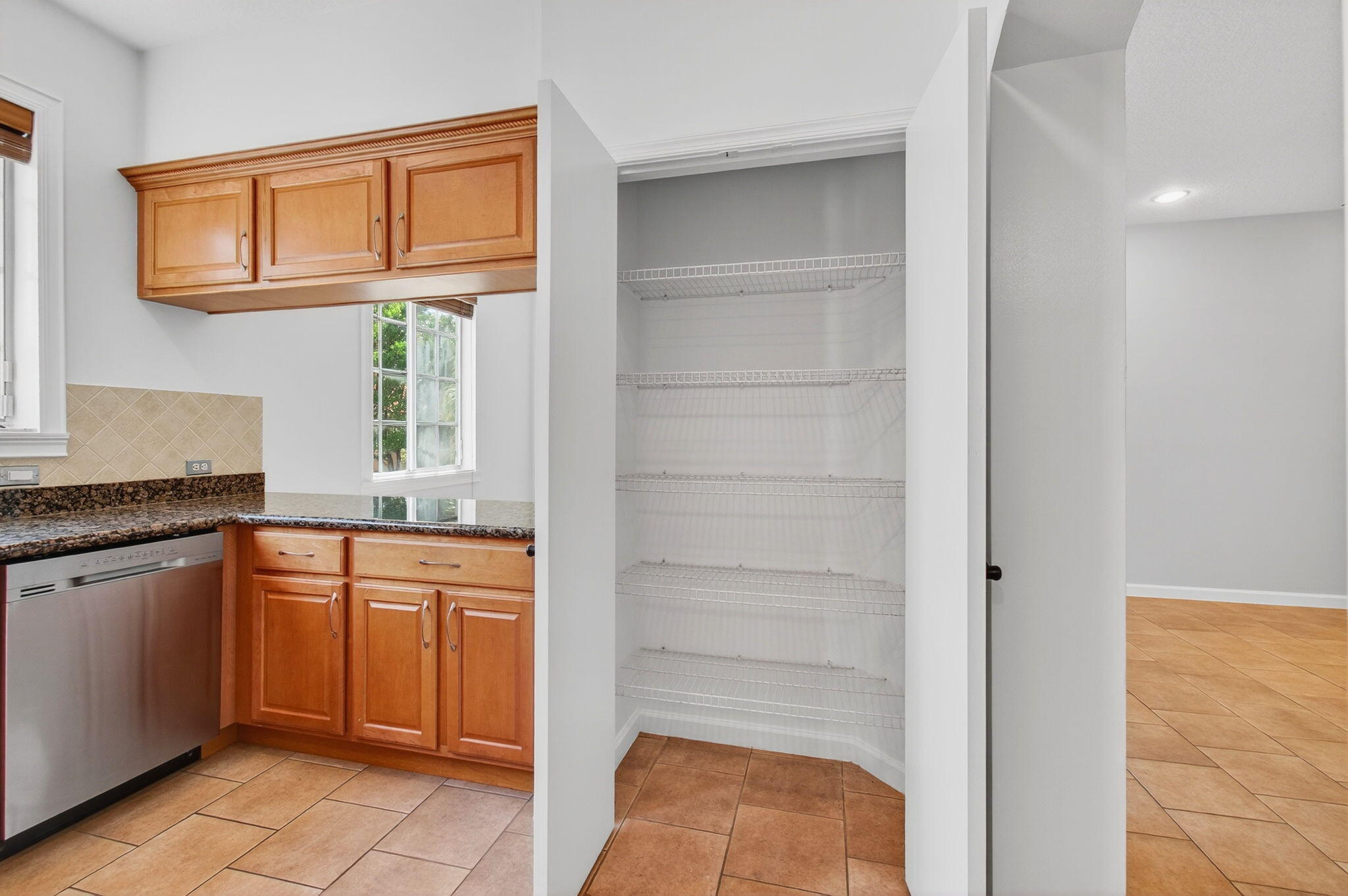 4582 Danson Way Delray Beach, FL 33445 - Photo 8 of 74 a kitchen with granite countertop cabinets and oven