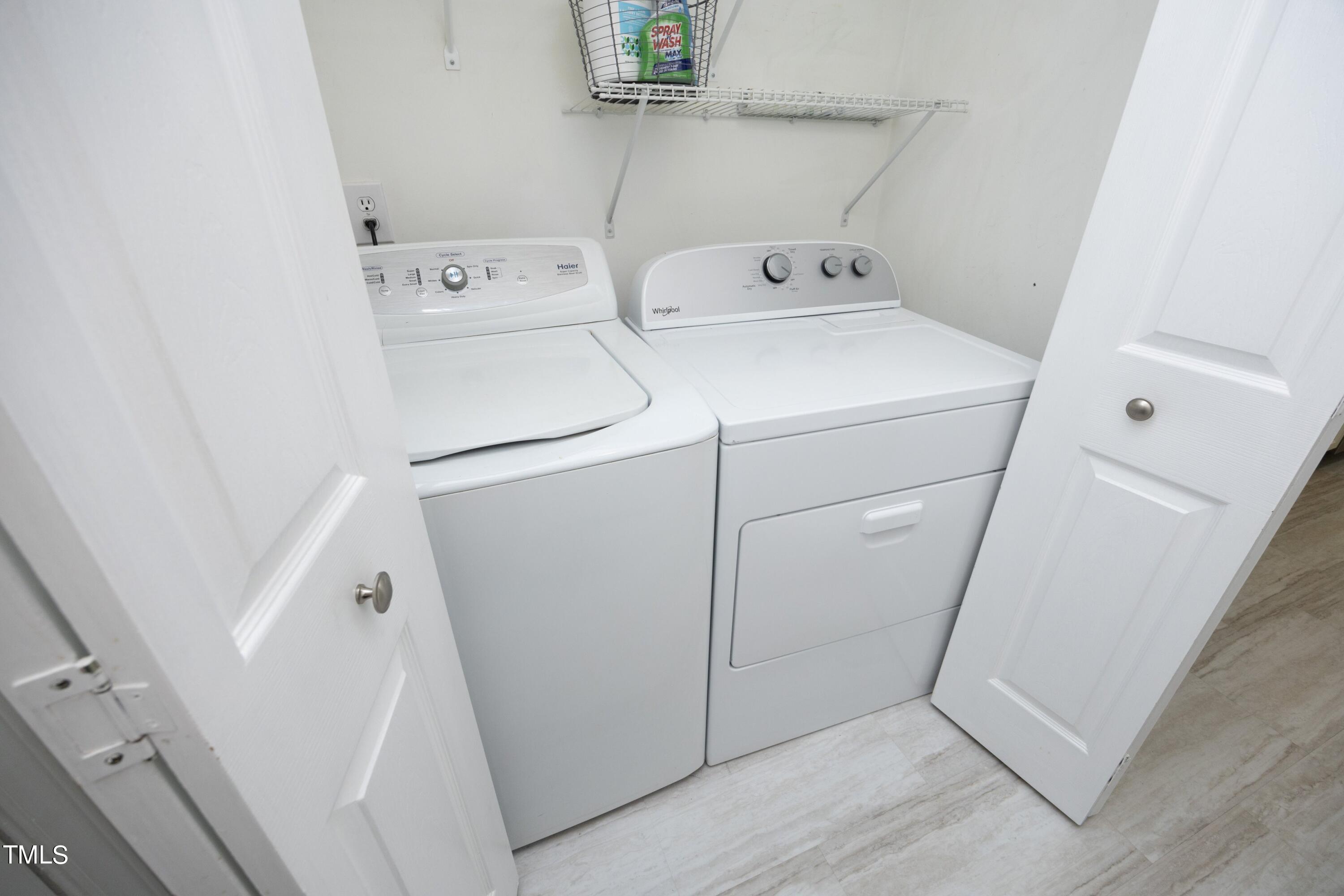 8904 Castleton Lane Raleigh, NC 27615 - Photo 19 of 43 a utility room with dryer and washer