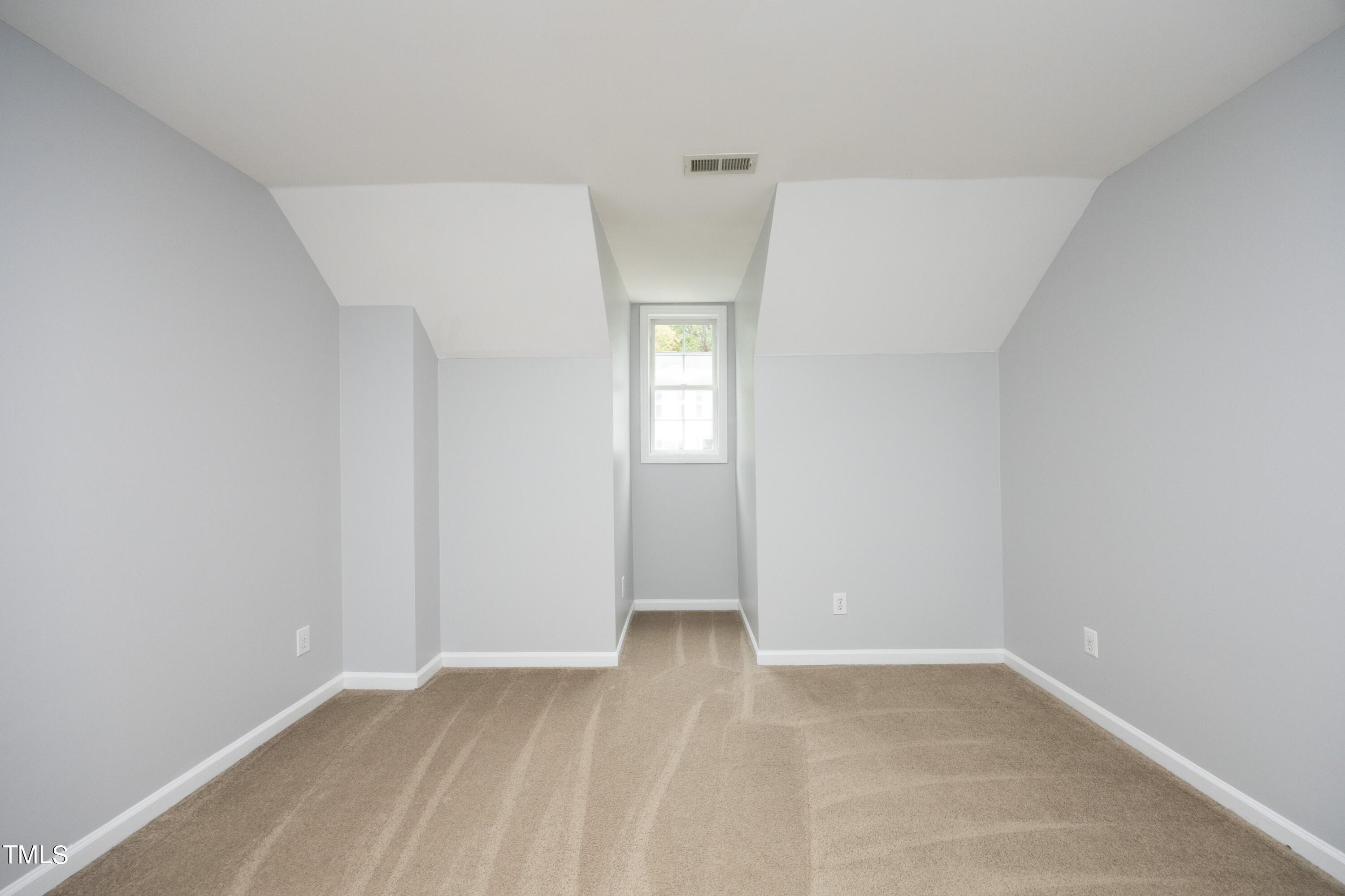 8904 Castleton Lane Raleigh, NC 27615 - Photo 24 of 43 a view of an empty room with window