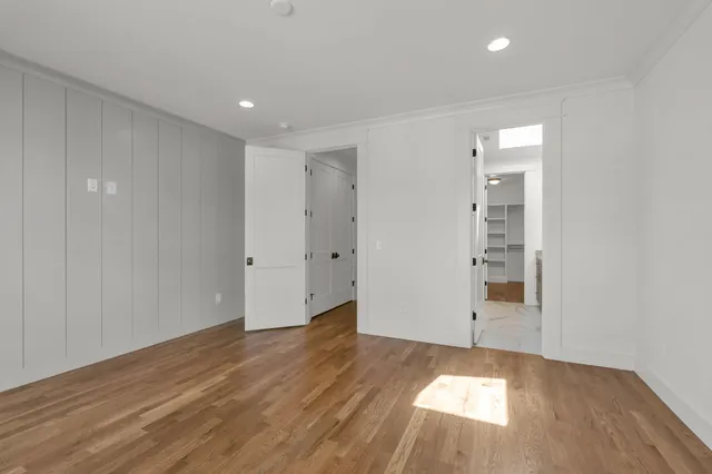 a bathroom with a granite countertop sink mirror and double