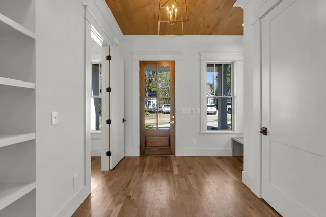 a bathroom with a sink and a window