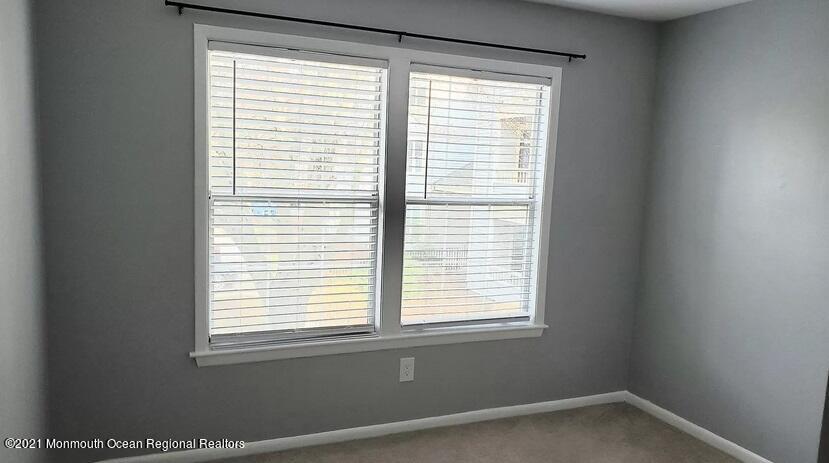 a view of a room that has a window in it