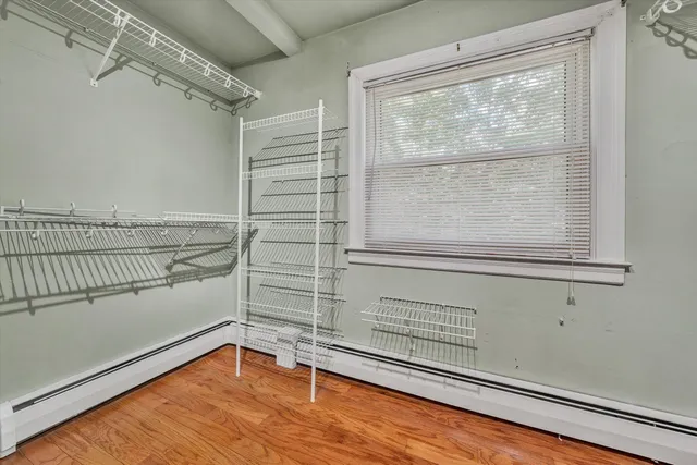 an empty room with white walls and white walls