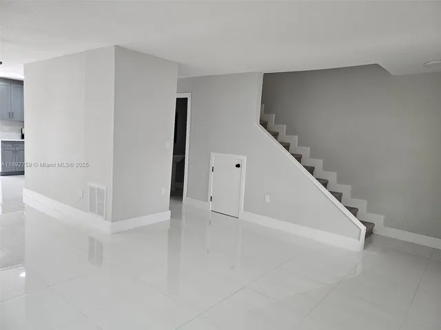 a view of an entryway with staircase