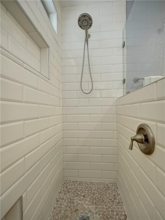 715 Beach Access Road, Unit 1204 Port Aransas, TX 78373 - Photo 18 of 33 a bathroom with a shower