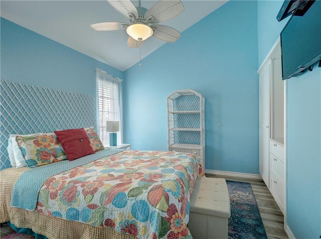 715 Beach Access Road, Unit 1204 Port Aransas, TX 78373 - Photo 22 of 33 a bedroom with a bed and window