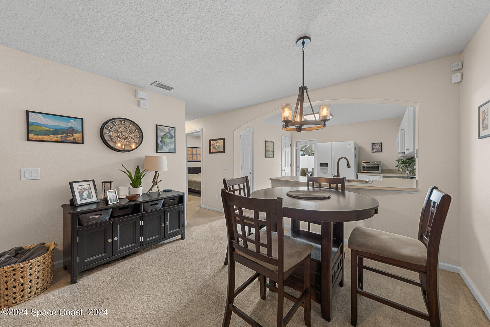 890 Luminary Circle, Unit 103 Melbourne, FL 32901 - Photo 11 of 32 a view of a dining room and livingroom