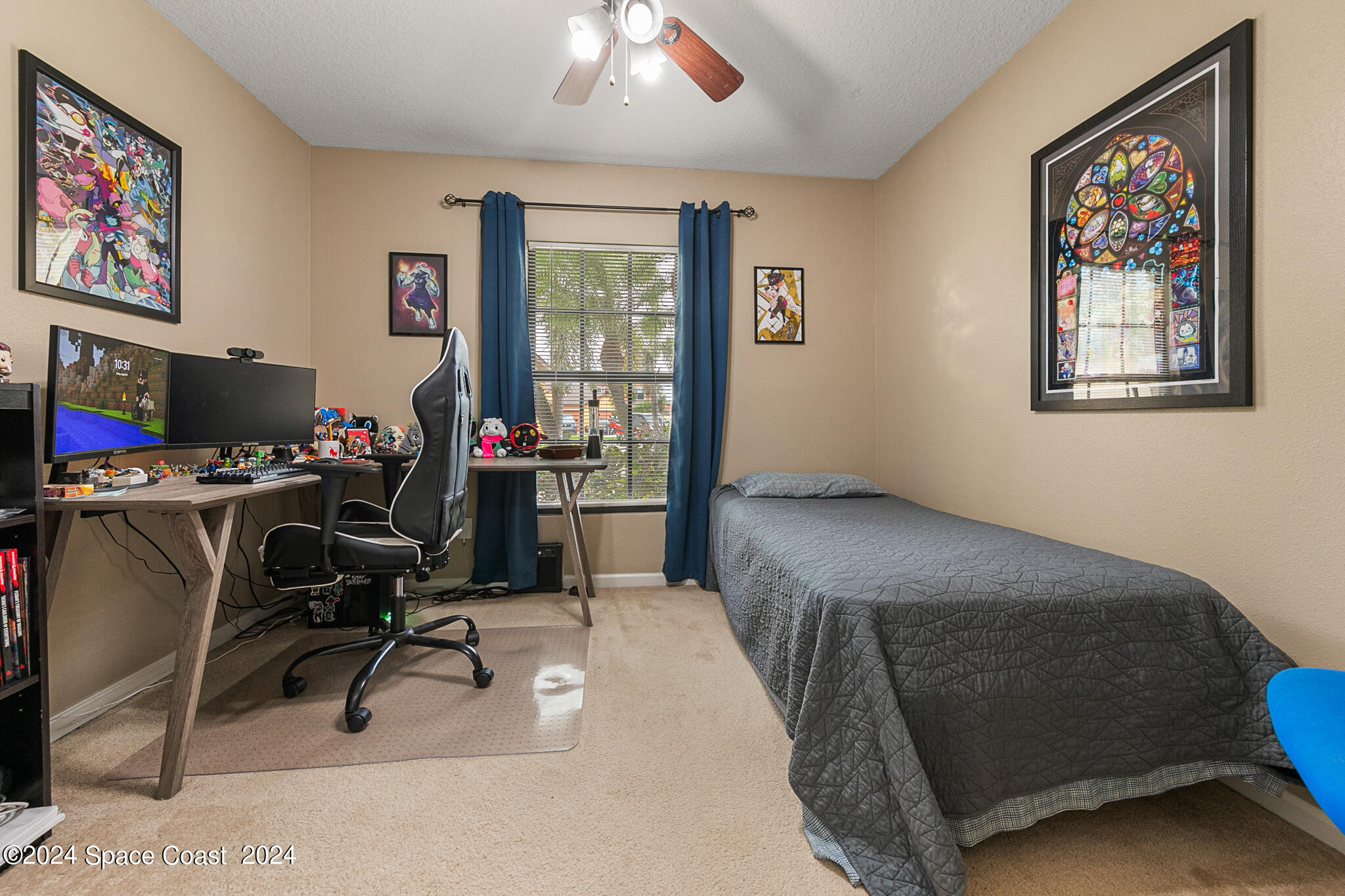 890 Luminary Circle, Unit 103 Melbourne, FL 32901 - Photo 16 of 32 a bedroom with workspace and a window