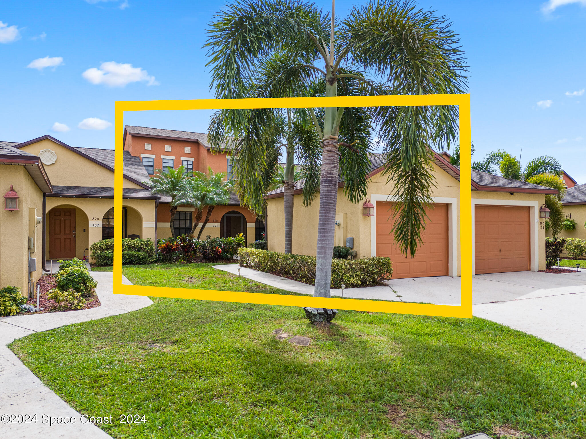 890 Luminary Circle, Unit 103 Melbourne, FL 32901 - Photo 2 of 32 a view of a house with swimming pool and a yard