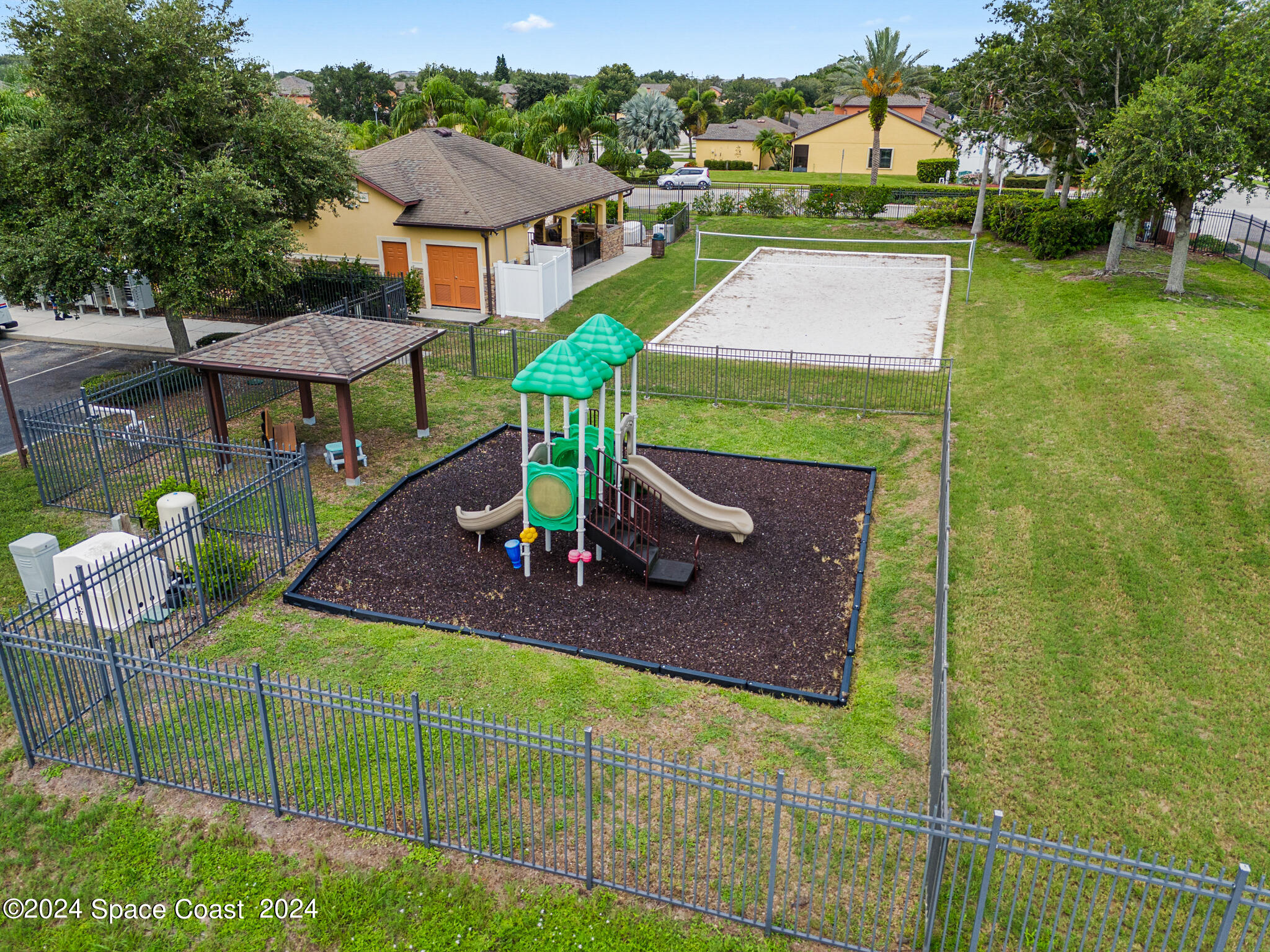 890 Luminary Circle, Unit 103 Melbourne, FL 32901 - Photo 26 of 32 a view of a house with a yard