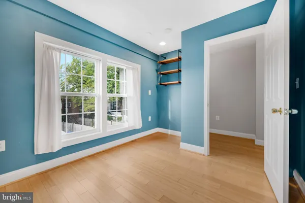 a view of an empty room with a window