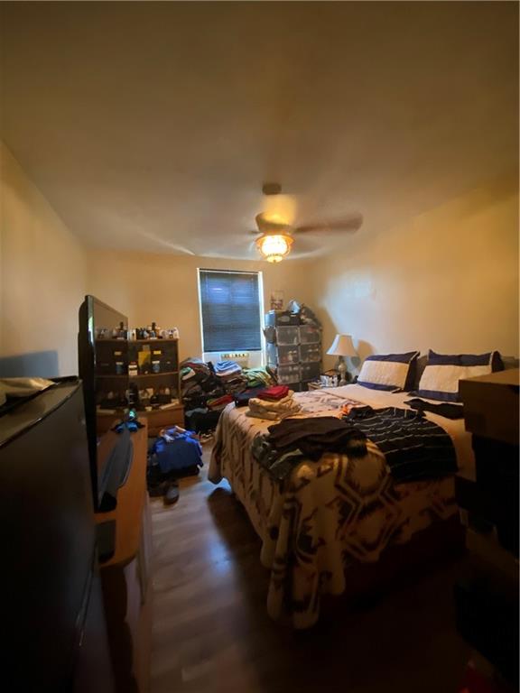 116 Helen Street McKees Rocks, PA 15136 - Photo 13 of 32 a bed sitting in a bedroom next to a window