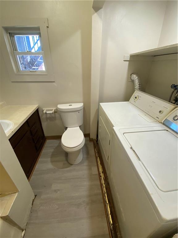 116 Helen Street McKees Rocks, PA 15136 - Photo 8 of 32 a bathroom with a toilet and a sink