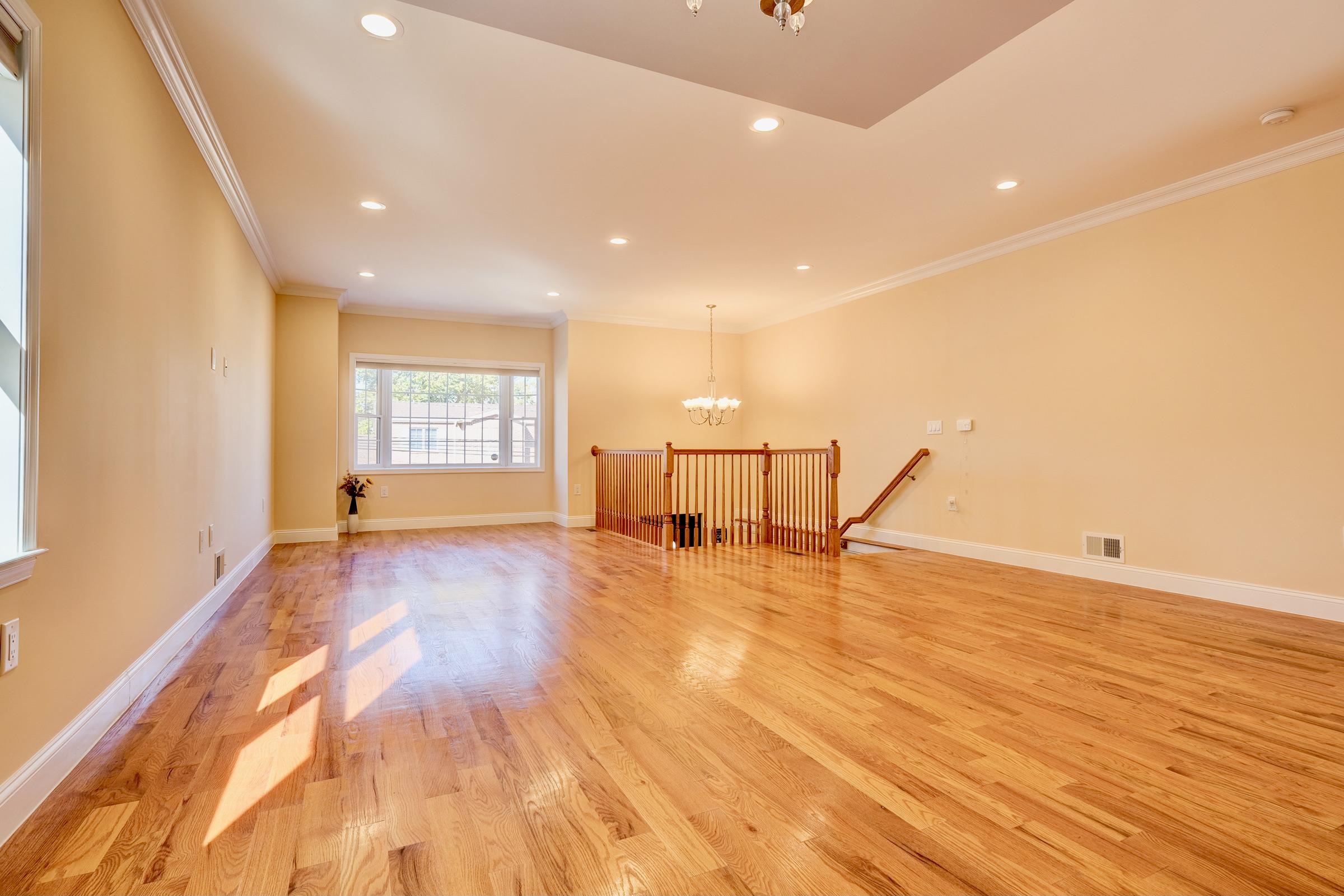 726 Chestnut Street, Unit B Secaucus, NJ 07094 - Photo 2 of 50 a view of empty room with wooden floor and fan